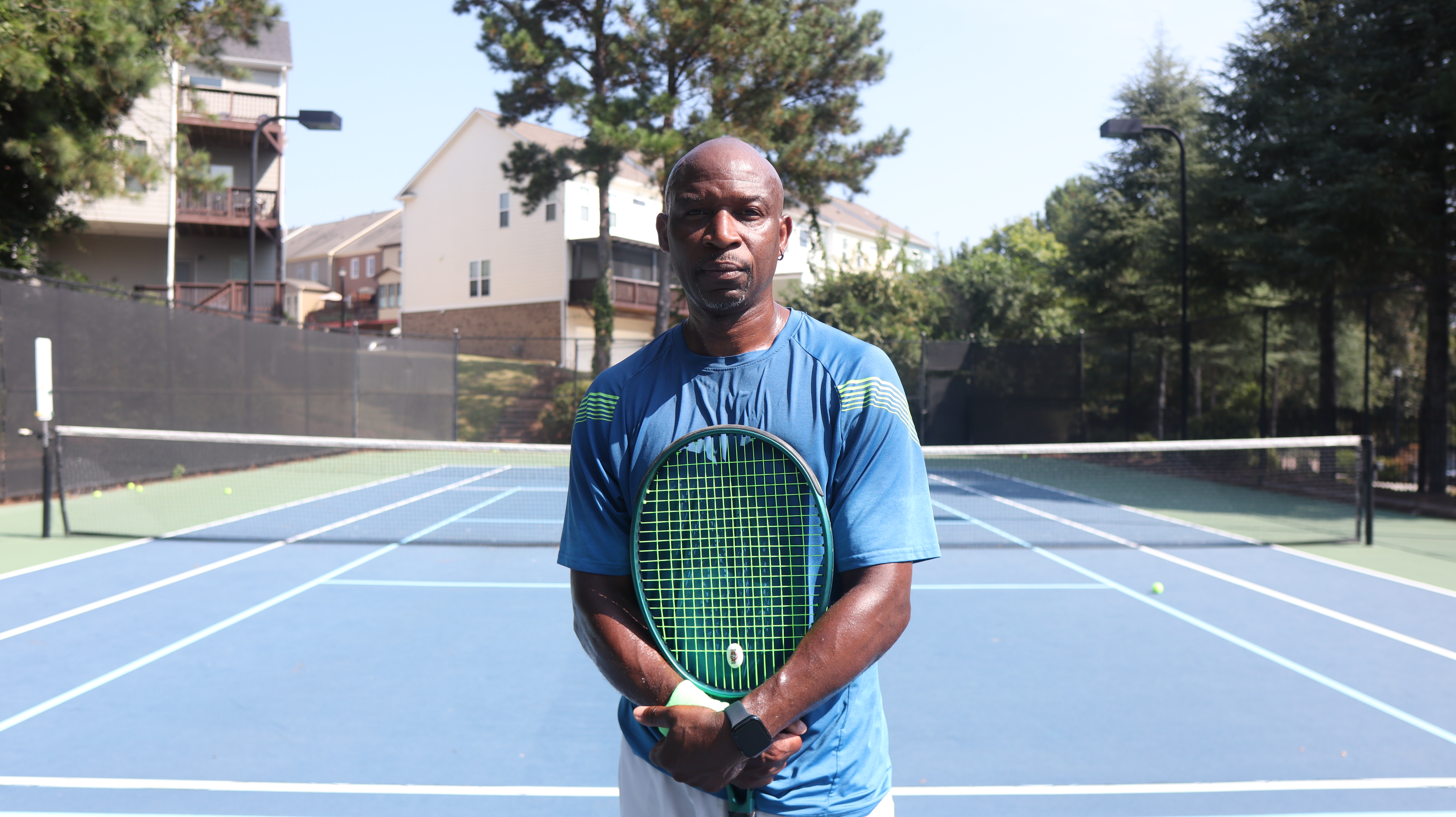 Shawn Conrad on the tennis court